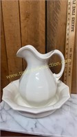 Pitcher and basin has chip on bowl