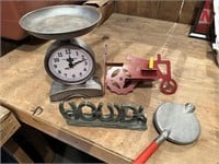 clock that looks like scale, metal tractor decor,