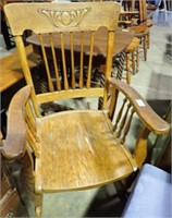 CARVED BACK ROCKING CHAIR