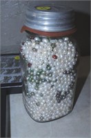 JAR OF CULTURED NATURAL PEARLS