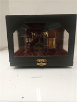 Miniature drum set in a display case