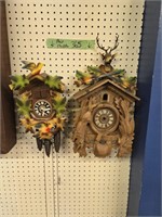 Pair of cuckoo clocks one is missing weights and