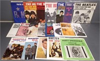 Collection of 20 - 45 rpm records with picture