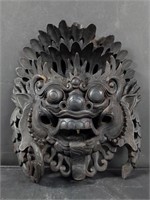 Vintage Indonesian carved wood wall mask