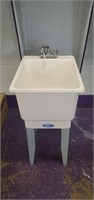 (1) Tub Sink and (1) 2 1/2 gallon Container