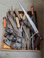 Various sizes and styles of files, hand saws, and