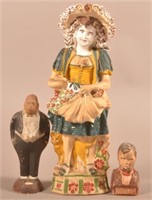 Three Solid Cast Chalkware Figures.