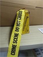 Roll of crime scene ribbon tape.