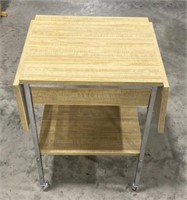 End table with foldable extending sides 29”