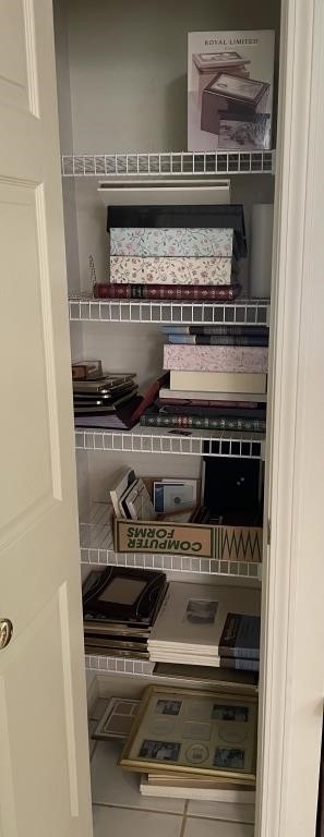 Closet filled w/ picture frames & photo albums