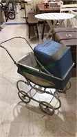 Vintage baby doll carriage just needs to be