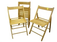 Set of four folding, wooden chairs