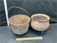 2 cast iron 3 legged pots