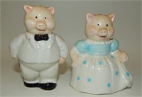Anthropomorphic Pig Couple in Dress Clothes