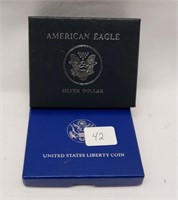 2001 Silver Eagle; 1986 Liberty Half Unc.