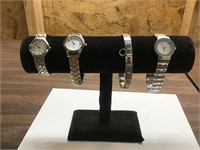 2 timex watches, 1 unknown; charm bracelet
