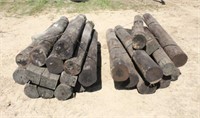 (2) Bundles of Round Wood Posts