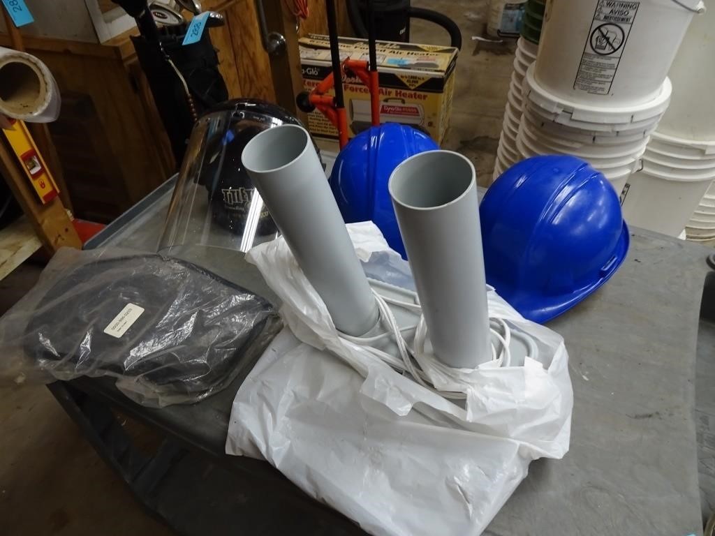 Plastic Tub full of PPE and Boot Dryer