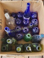 Box of Blue and Green Bottles