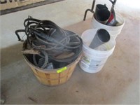 Basket w/jumper cables, buckets w/funnels, misc