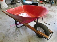 vintage red wheel barrow