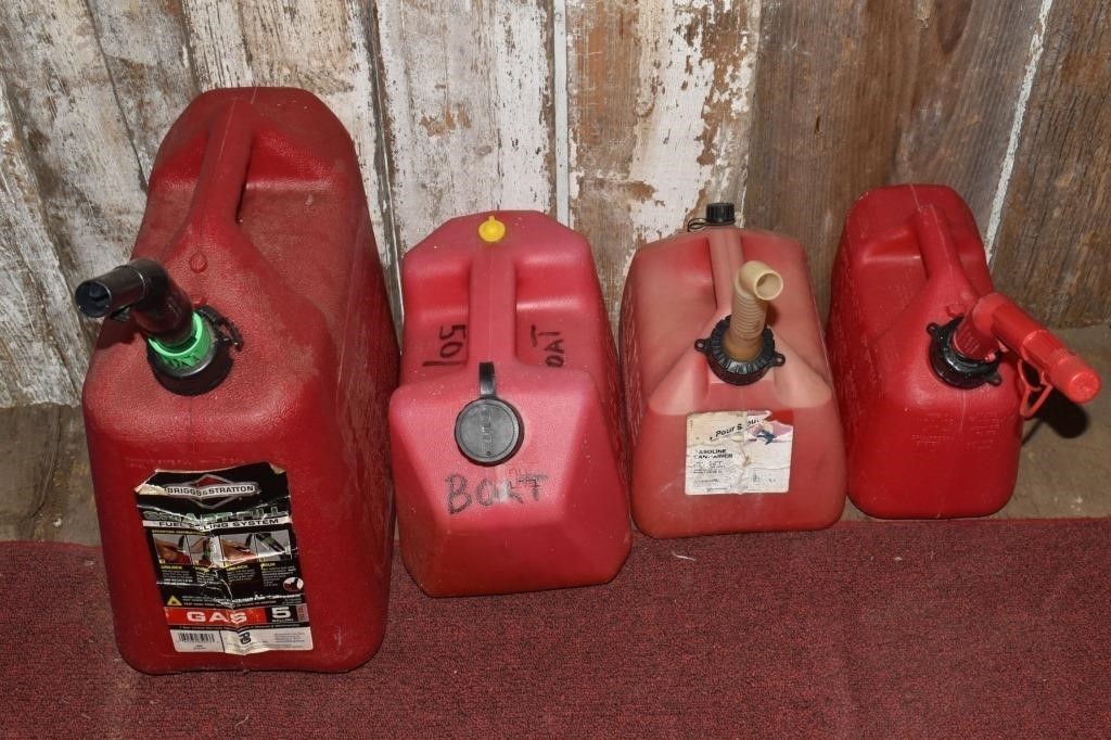 4 plastic gas cans; as is