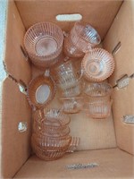 Assortment of pink depression bowls and cups
