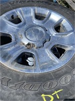 set of 4 265/65-18" tires on chevy aluminum rims