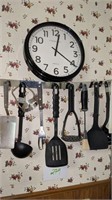 Clock and utensils with rack