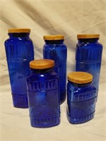 Lot of 5 blue glass canisters