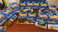 12 New Hot wheels new on card.  This lot is part