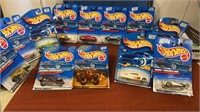 12 New Hot Wheels New on card. This lot in