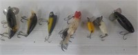Assortment of vintage fishing lures.