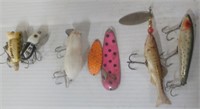 Assortment of vintage fishing lures.