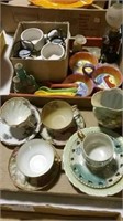 Two boxes of cups and saucers and other