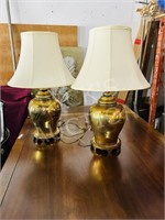 pair of heavy brass table lamps w/ etched flowers