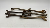 Small box of antique wrenches
