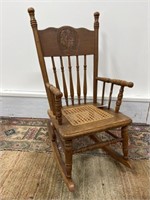 Oak Pressed Back Child's Rocker with Cane Seat