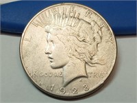 OF) Better date 1928 S silver peace dollar