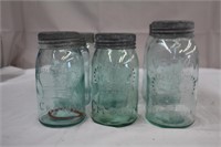 Eight Crown mason jars with glass tops, two