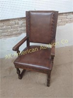 ANTIQUE LEATHER ARM CHAIR