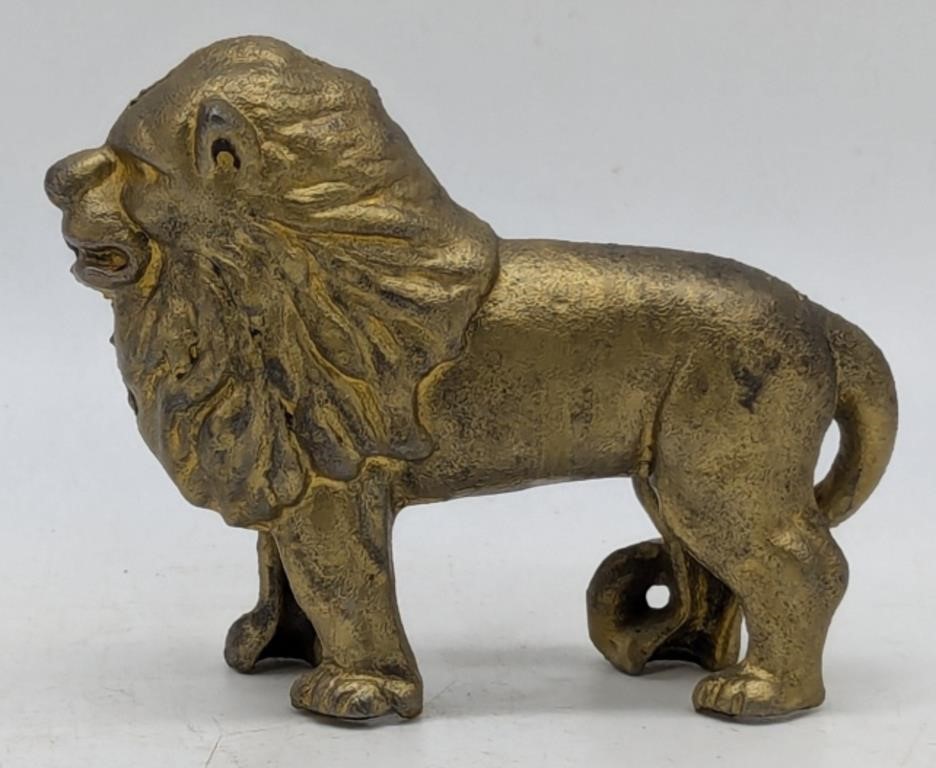 (R) Cast iron lion coin bank (3.5" tall).