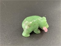 Alaskan Kobuk jade carved bear who has caught a la