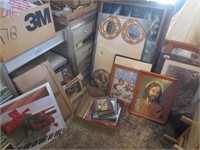 Several pictures in frames, large & small