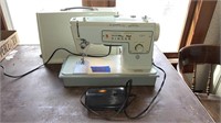 Singer Stylist sewing machine. Turns on and