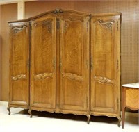 Louis XV Style Oak Four Door Armoire.
