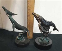 Metal whale figurines