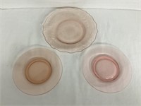 Three Pink Glass Plates