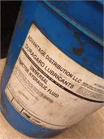 Three 5 gallon jugs of hydraulic fluid not sealed