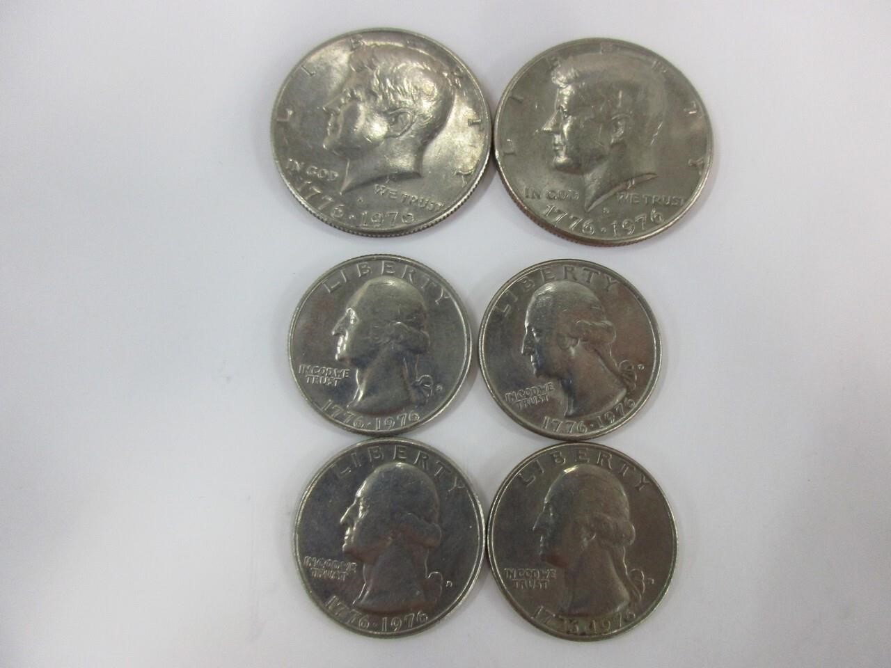 4 bicentennial coins, 2 half dollars, 4 quarters